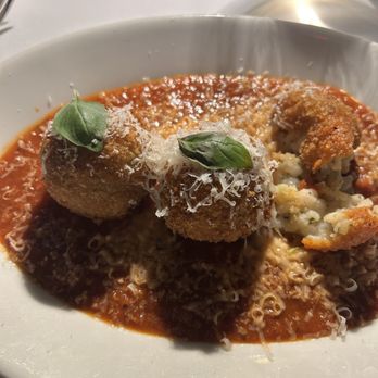 Caterina's signature dishes  Spaghetti and Meatballs, Veal Parmigiana, Lasagna, various handmade pastas, classic Italian-American appetizers. (Jackets required for men).